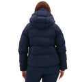 A person wearing the navy blue Georgie Puffer Jacket by Halfdays, featuring performance elements and a hood, is seen from the back against a white background. Ideal for hitting the slopes in style and functionality.