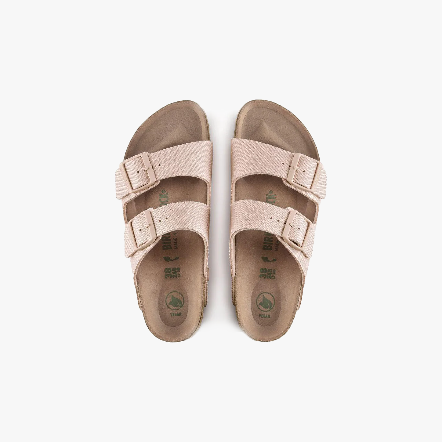 Birkenstock Arizona Vegan sandals in Canvas Soft Pink (W) feature adjustable buckles and contoured footbeds. Shown from above on a white background. For the perfect fit, see our Birkenstock sizing chart.