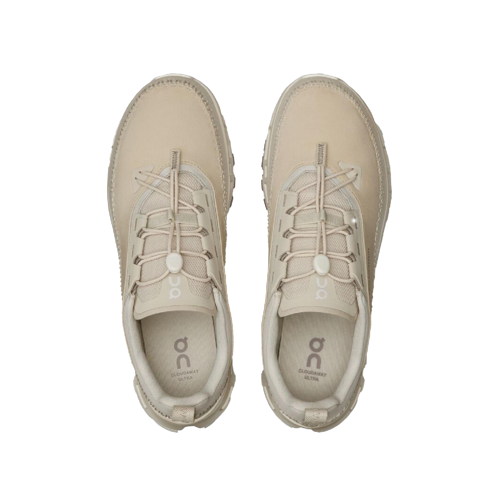 Top view of a pair of Women's Cloudaway 2 sneakers by On Running in beige, featuring elastic laces, a branded insole, and a Missiongrip™ outsole for ultimate traction.