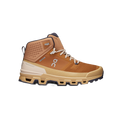 Introducing the Men's Cloudrock 2 Waterproof by On Running: a tan and brown high-top hiking shoe featuring a textured sole, lace-up front, and signature branded logo on the side. Equipped with a waterproof membrane and Missiongrip™ rubber, these shoes provide superior traction for tackling challenging trails. Ideal for stylishly conquering any adventure.