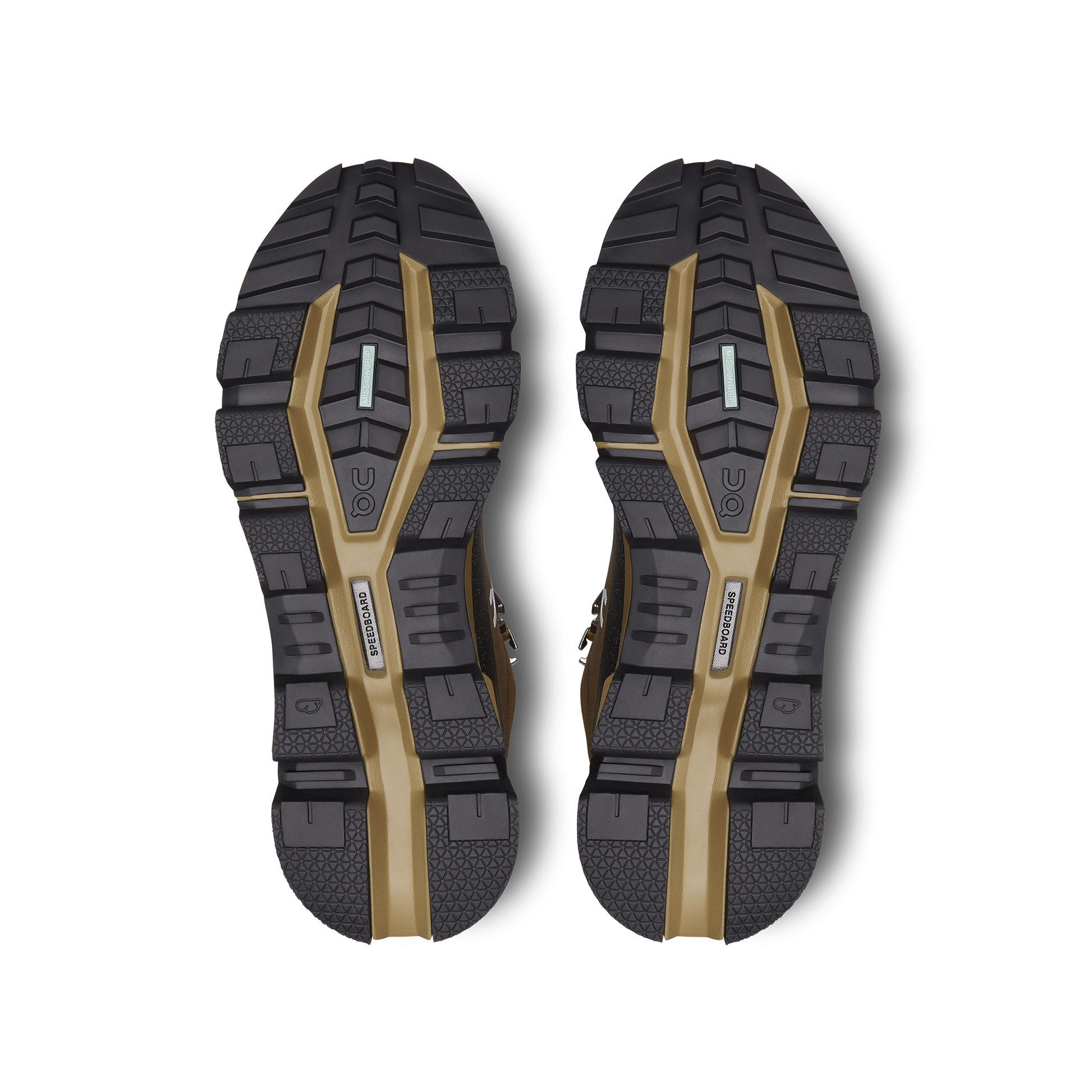 The image displays the expertly crafted shoe soles of the Women's Cloudrock 2 Waterproof by On Running, featuring black and brown hues with textured patterns and brand logos. These soles are specifically designed for speed-hiking boots, offering excellent shock absorption to ensure both durability and comfort on challenging terrains.