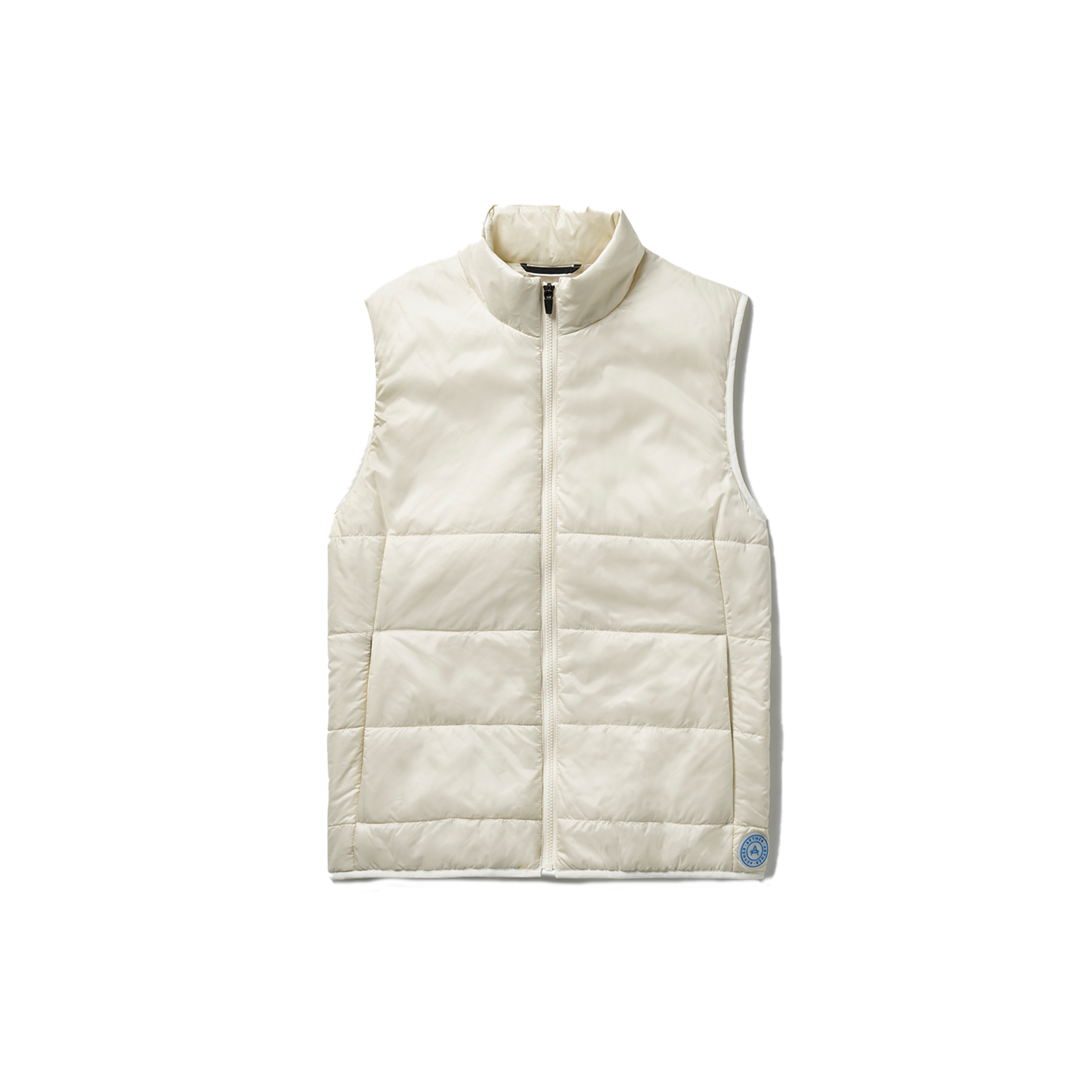 Introducing the Aether Eco Insulated Vest, a stylish cream-colored quilted vest designed with a high collar and zipper front, crafted from sustainable materials. It features a small round logo patch on the lower left side, merging fashion with eco-friendly values.