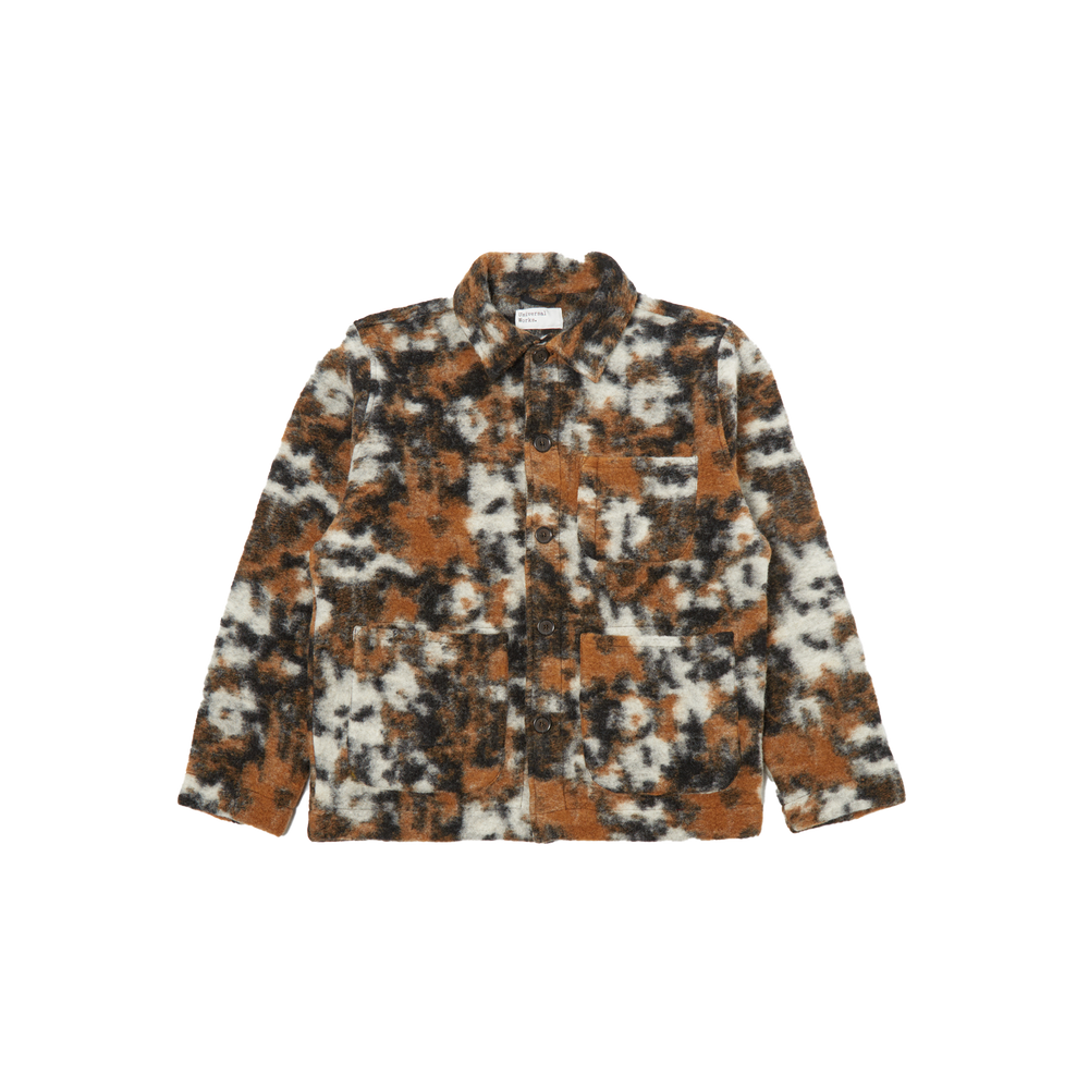 The Field Jacket Fleece by Universal Works offers a loose fit and is crafted from a wool polyester blend, showcasing a brown, black, and white abstract pattern with multiple pockets on display against a plain background. It is expertly designed for men's sizing.