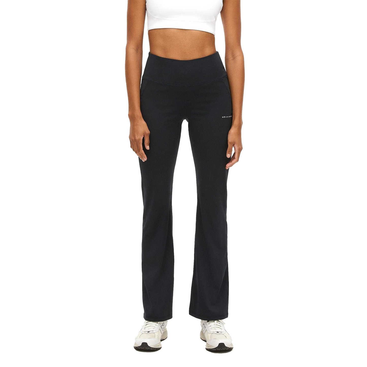A person stands facing forward wearing Rohnisch's Flattering High Waist Pants. Their outfit, featuring a white crop top and white sneakers, is accentuated by the plain background. The breathable fabric of the leggings ensures comfort while highlighting a stylish look.