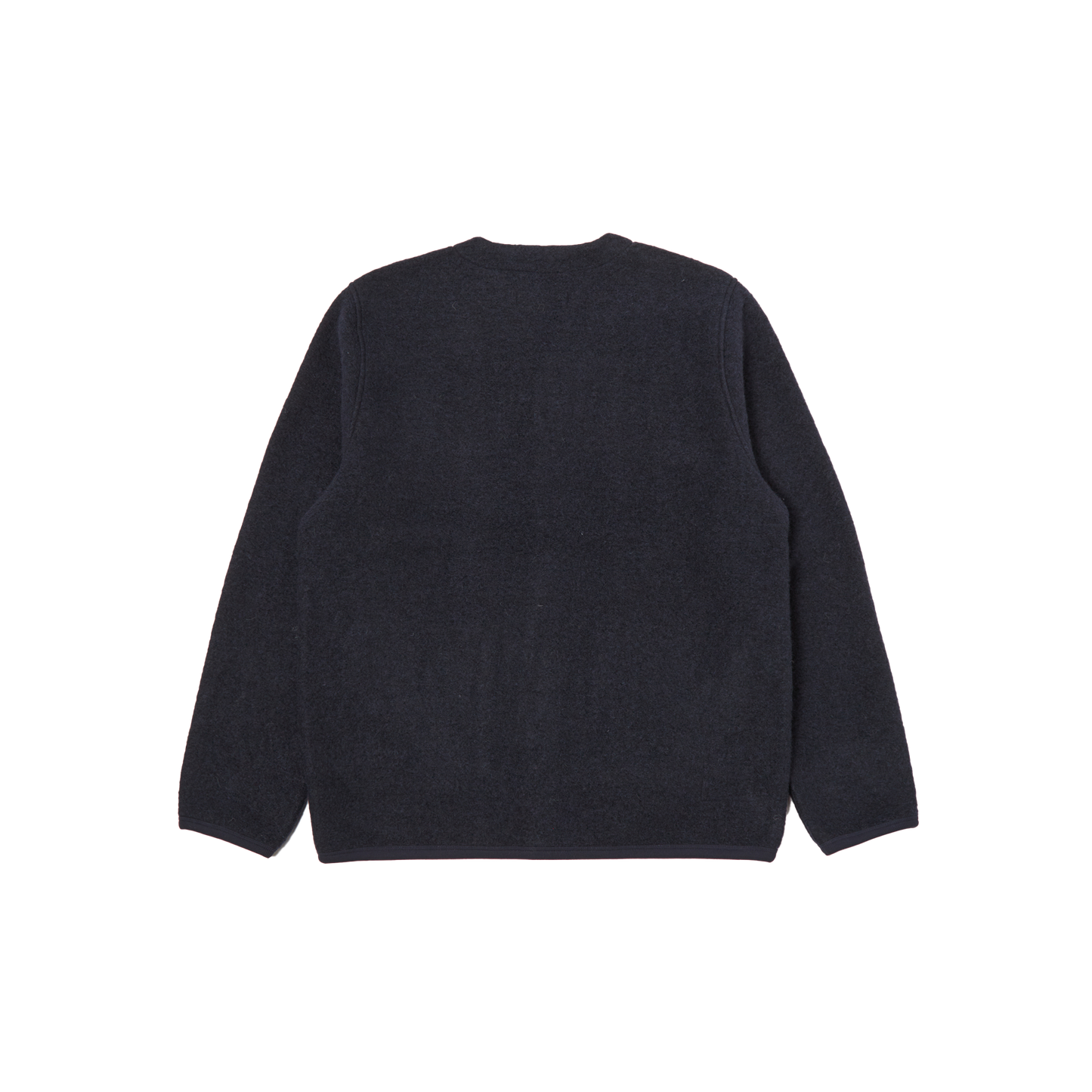 A view from the back showcases the navy blue wool blend Fleece Cardigan by Universal Works.