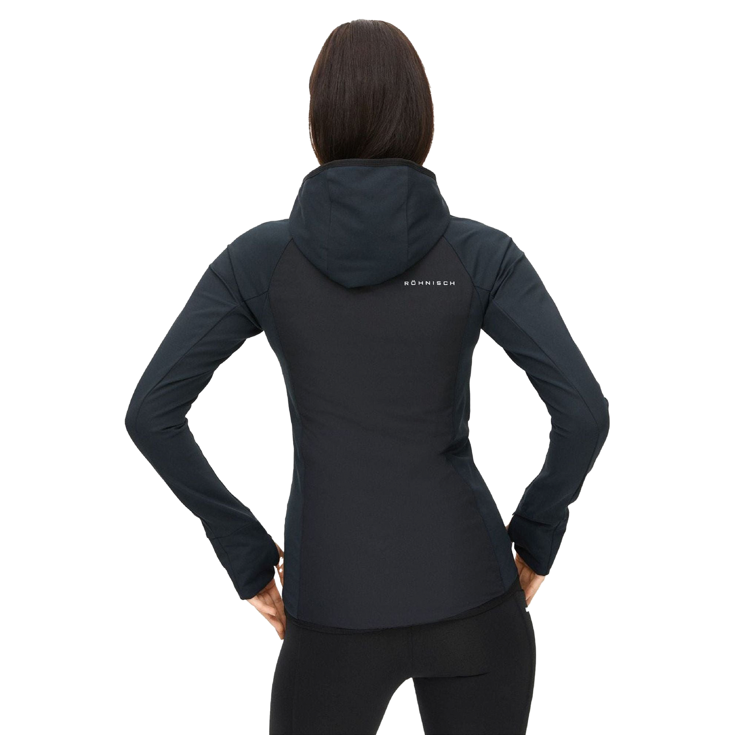 A person wearing the Free Motion Padded Jacket, a dark hooded jacket from Rohnisch made of quilted woven polyester, stands with their back to the camera, hands on hips.