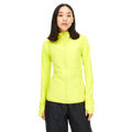 A person wearing the Rohnisch Free Motion Padded Jacket in bright yellow and black pants stands against a plain background.