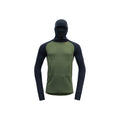 Introducing the Devold M Expedition Arctic Hoodie in Forest Ink: a green/black Merino wool long-sleeve top with a hood, face covering, thumb holes, and kangaroo pocket—ideal for outdoor adventures.