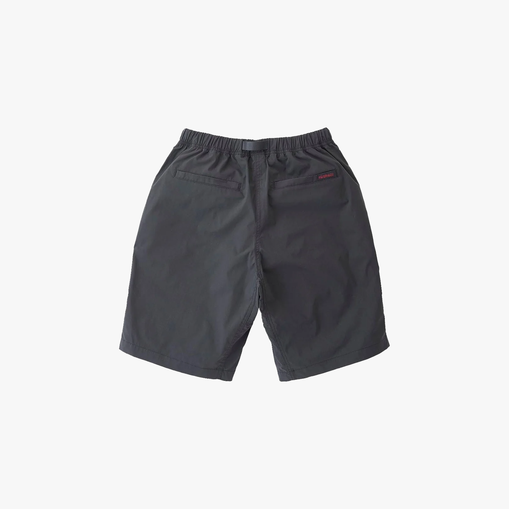 Gramicci Density Stretch ST-Short in dark gray, featuring a flexible waistband, two side pockets, and one back pocket—ideal for outdoor activities. Shown against a plain white background.