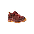 The Hoka U Tor Ultra Lo in Spice/Hot Sauce is a maroon and orange athletic shoe with a thick sole, lace-up design, side perforations for ventilation, and a heel loop for easy pulling.