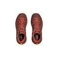 Top view of Hoka's U Tor Ultra Lo in Spice/Hot Sauce color, showcasing brown exterior with black insoles and yellow heel loops on a white background.