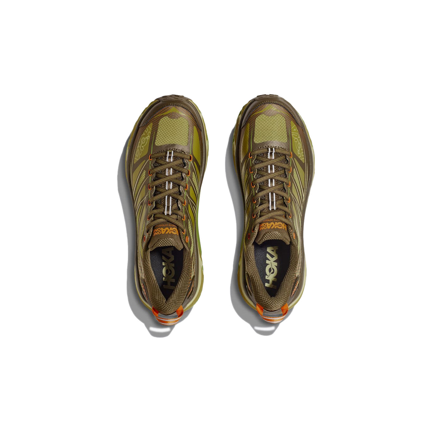 The Hoka U Mafate Speed 2 in Dark Olive/Golden Lichen features the Vibram Mega-Grip for trail adventures, showcasing its green and orange design with white laces from an aerial view.