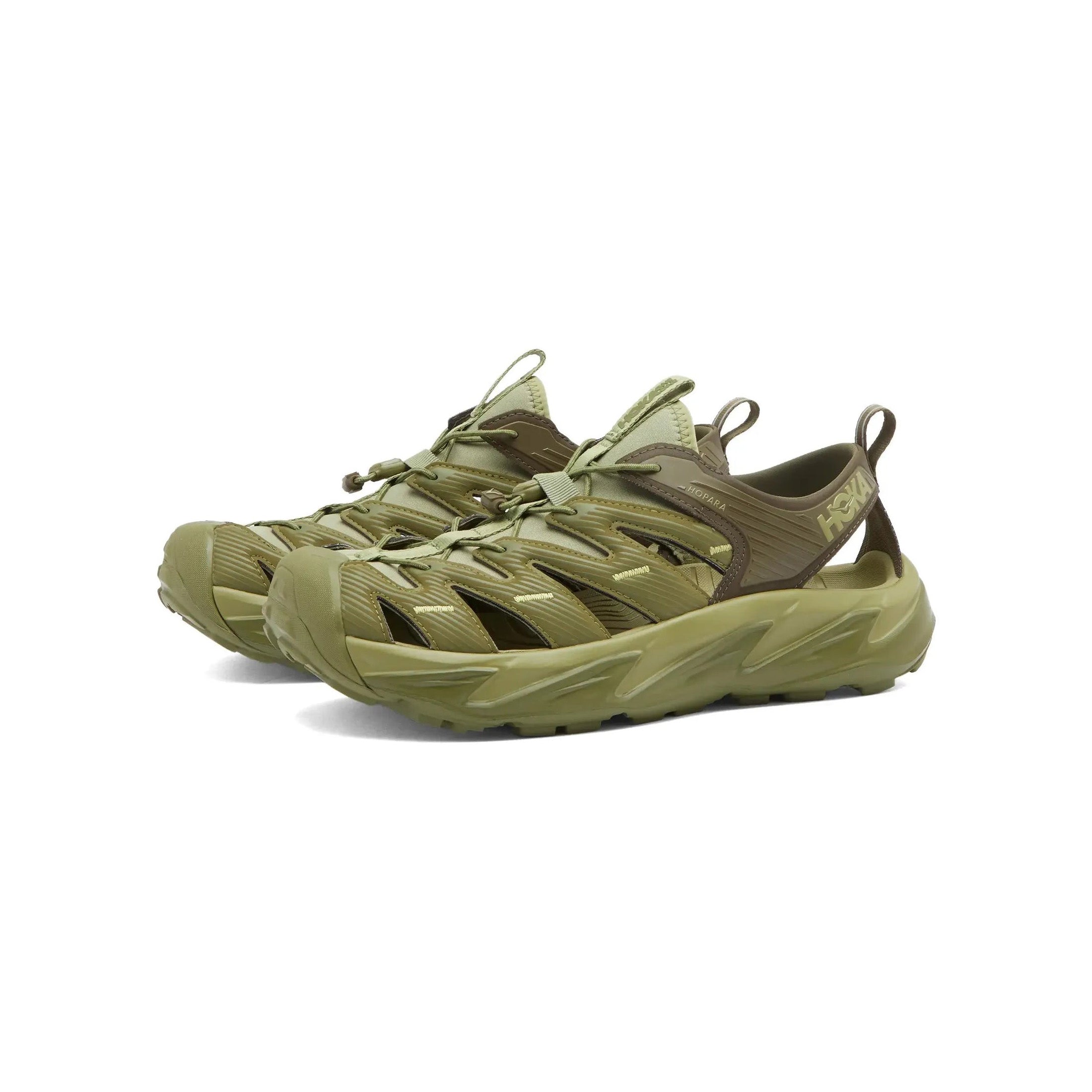 Hoka's U Hopara in Forest Floor/Fennel are olive green hiking sandals with a cut-out design, thick sole, and Quick Lace system for easy adjustments. Ideal for outdoor adventures with a sticky rubber outsole offering excellent grip.