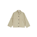 The Aiayu Jules Jacket is a beige, long-sleeve, oversized button-up with large front pockets and a collar. It's made from weather-resistant Ventile fabric, combining style and practicality against a white background.