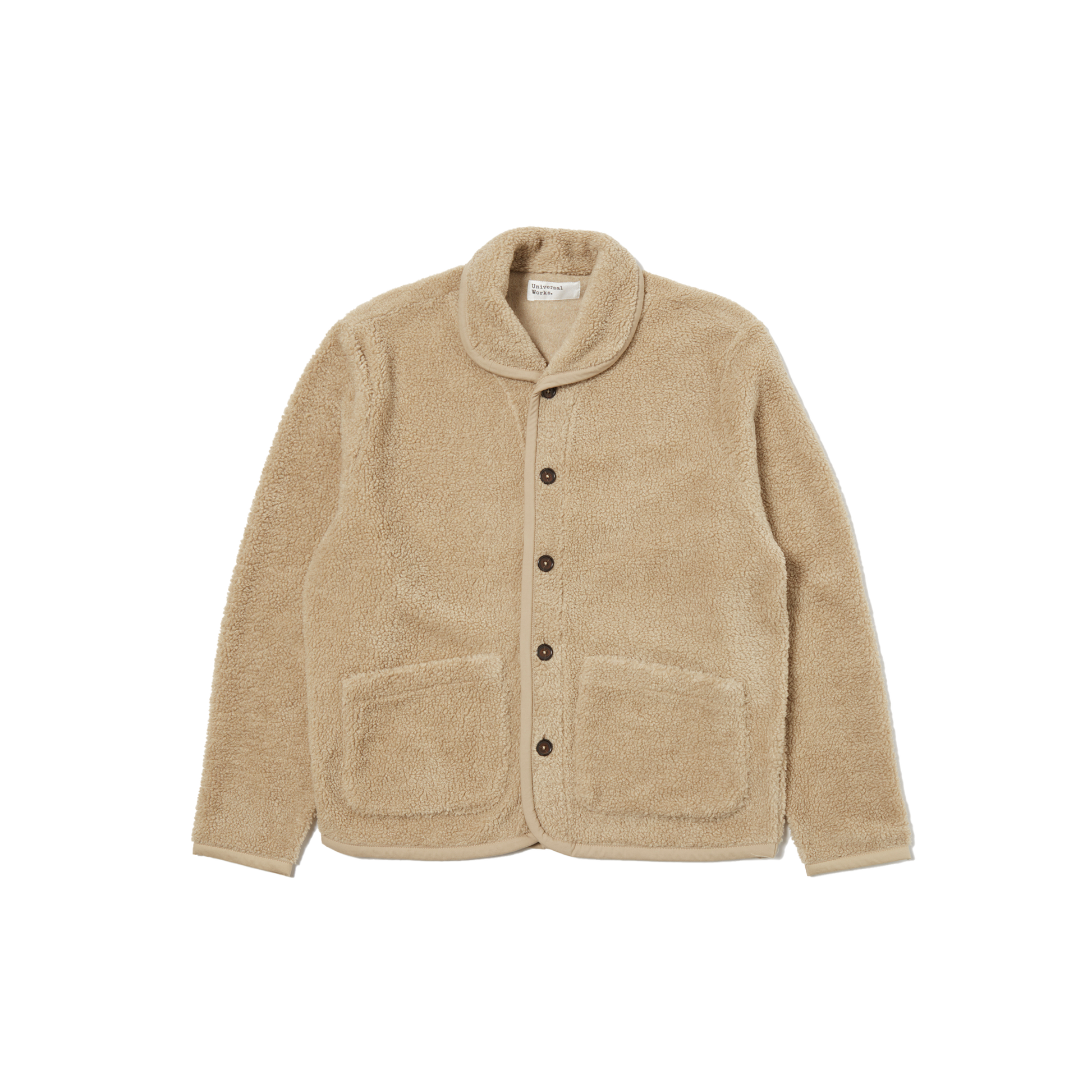 The Lancaster Fleece Jacket by Universal Works is a beige fleece jacket that features a stylish shawl collar, long sleeves, button closure, and two front pockets, showcased against a plain background.