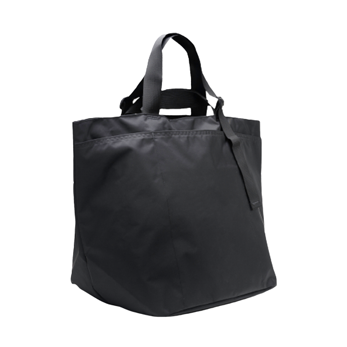 The Large Double Handle Tote by Bags in Progress is a black woven nylon bag with two short handles and a flat base, standing upright against a white background.