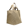 A spacious tote bag crafted from woven nylon, designed with short straps and a side profile view; the "Large Double Handle Tote" by Bags in Progress comes in beige.
