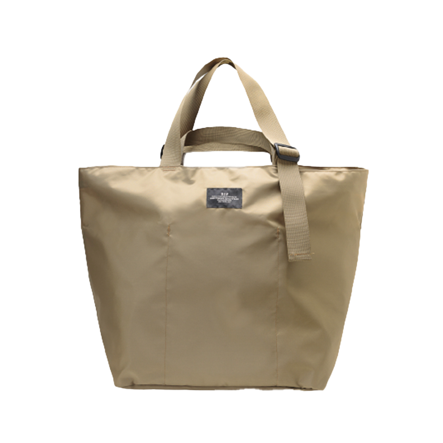 The Large Double Handle Tote by Bags in Progress is a beige bag made from woven nylon, featuring short double handles and a small front label.