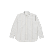 The Lazy Day Shirt by Universal Works is designed with a relaxed fit, presenting a sleek white button-down style adorned with thin vertical stripes on a black backdrop and featuring an eye-catching asymmetrical pocket.