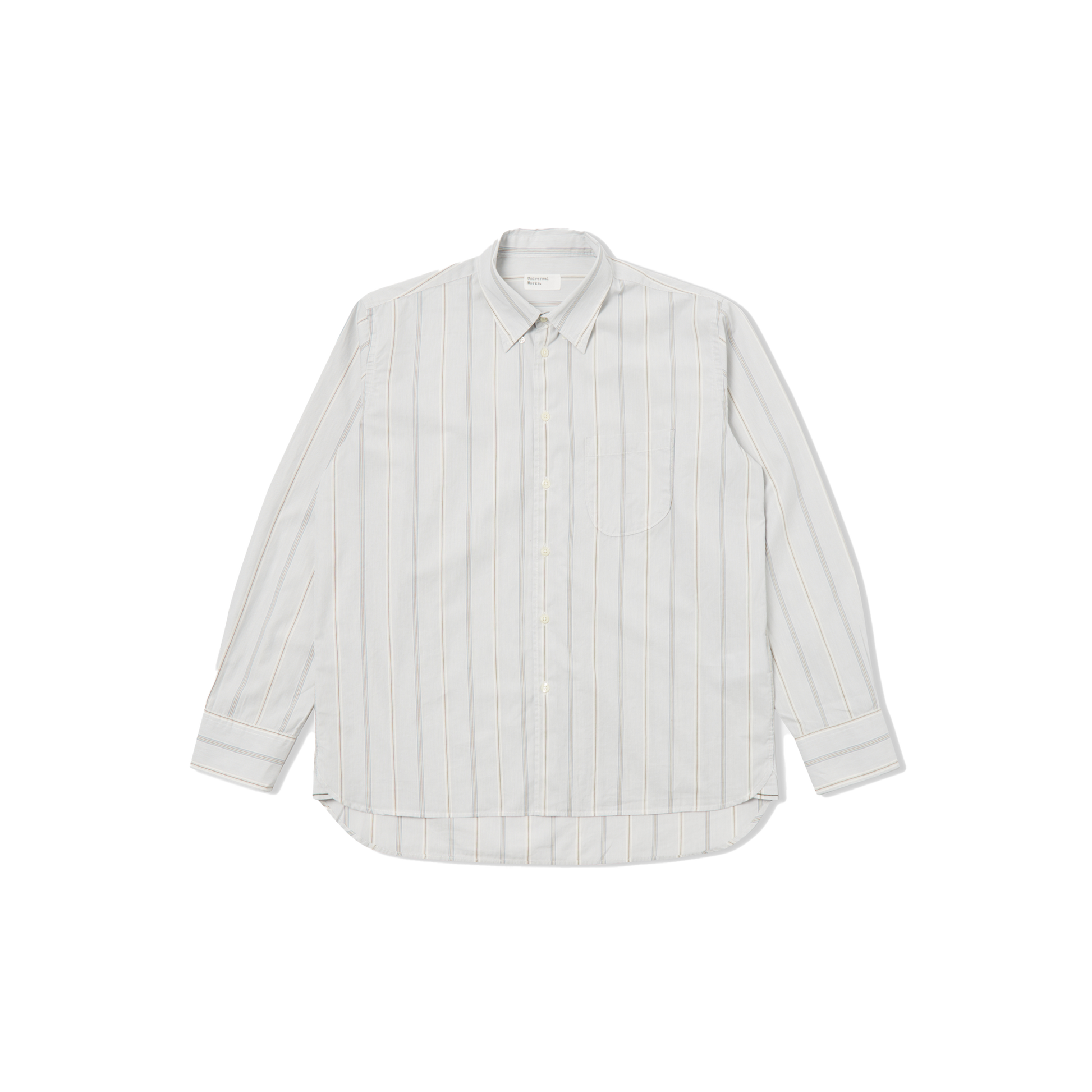 The Lazy Day Shirt by Universal Works is designed with a relaxed fit, presenting a sleek white button-down style adorned with thin vertical stripes on a black backdrop and featuring an eye-catching asymmetrical pocket.