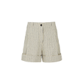 The Lee Shorts Check by Aiayu features cuffed hems, a black button, and a distinctive pattern of dark and light squares. Made from organic Chetna cotton, they combine style with sustainability and are GOTS certified.