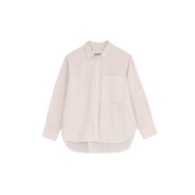 The Lynette Shirt by Aiayu is a light pink, oversized button-up with long sleeves and a front pocket, crafted from organic cotton against a plain backdrop. Embrace sustainable fashion with this stylish piece.