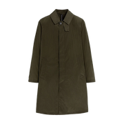 The Mackintosh M Shower Rain Coat in olive green is ideal for travel. It features a collar, button closure, and two pockets. Its water-repellent design keeps you stylish and dry on any adventure.