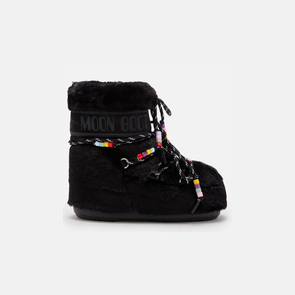 The Icon Low Faux Fur Beads by Moon Boot features a black fur design with colorful beads on the laces and "Moon Boot" text on the upper side.