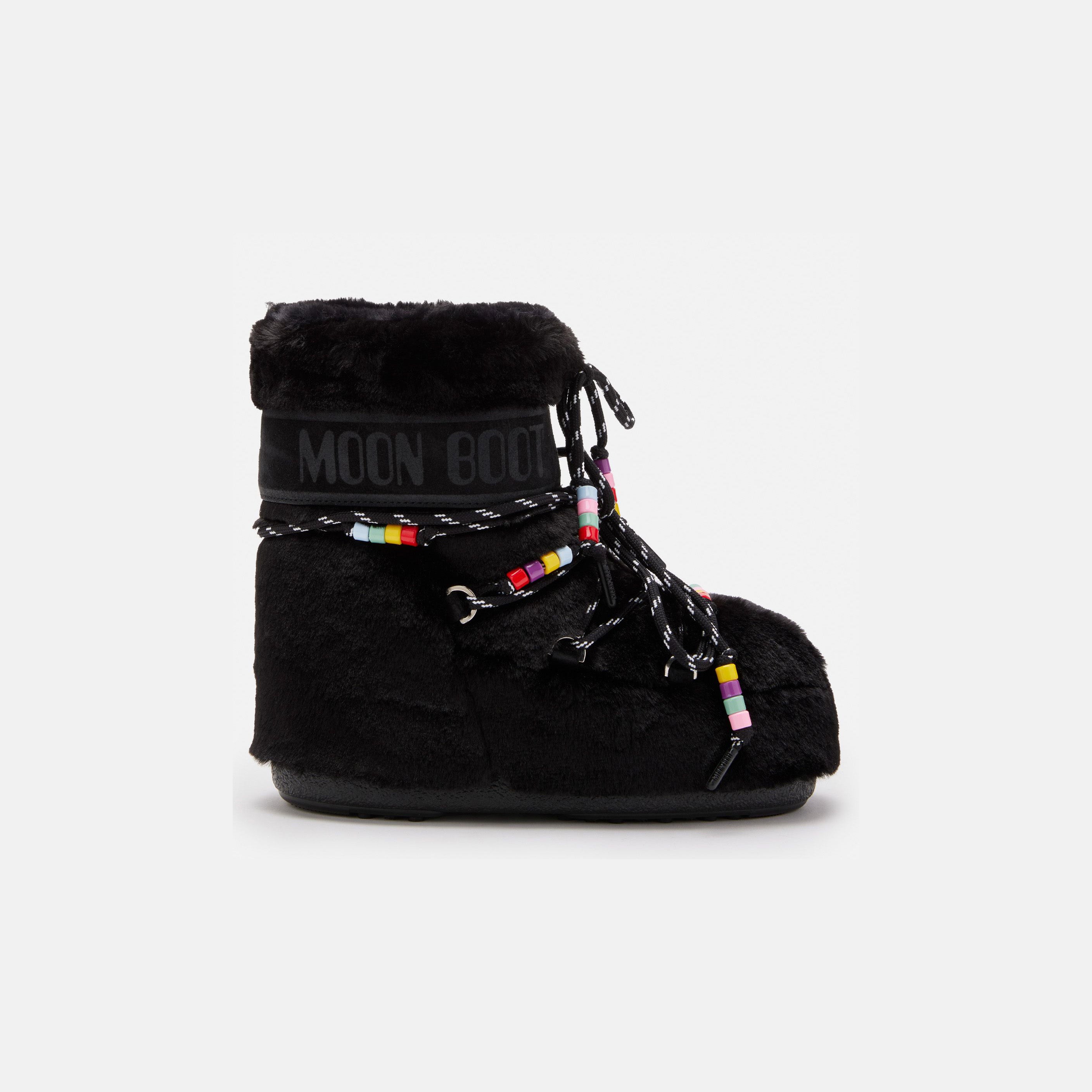 The Icon Low Faux Fur Beads by Moon Boot features a black fur design with colorful beads on the laces and "Moon Boot" text on the upper side.