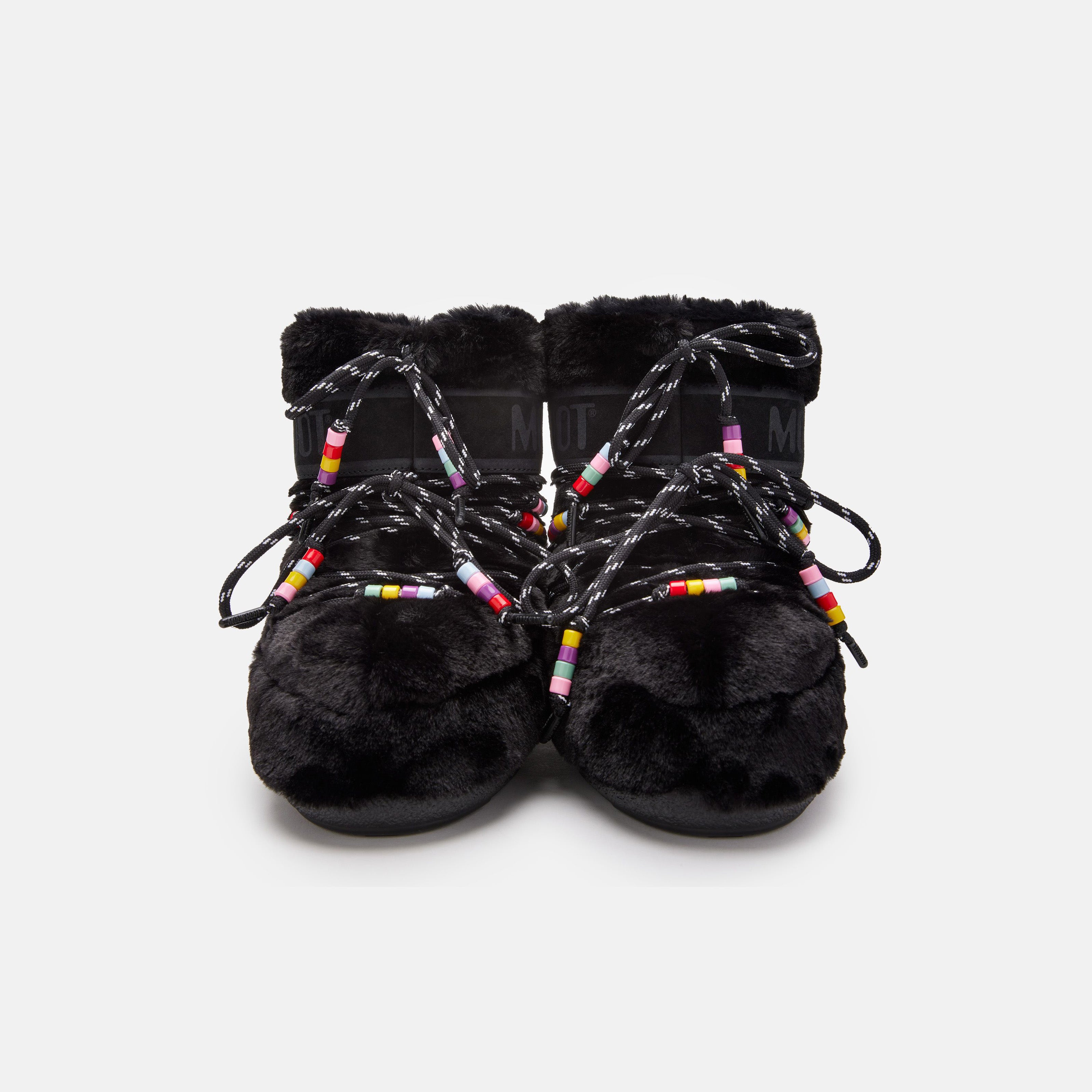 The "Icon Low Faux Fur Beads" by Moon Boot, featuring black fur and laces with colorful bead accents, front view on a white background.