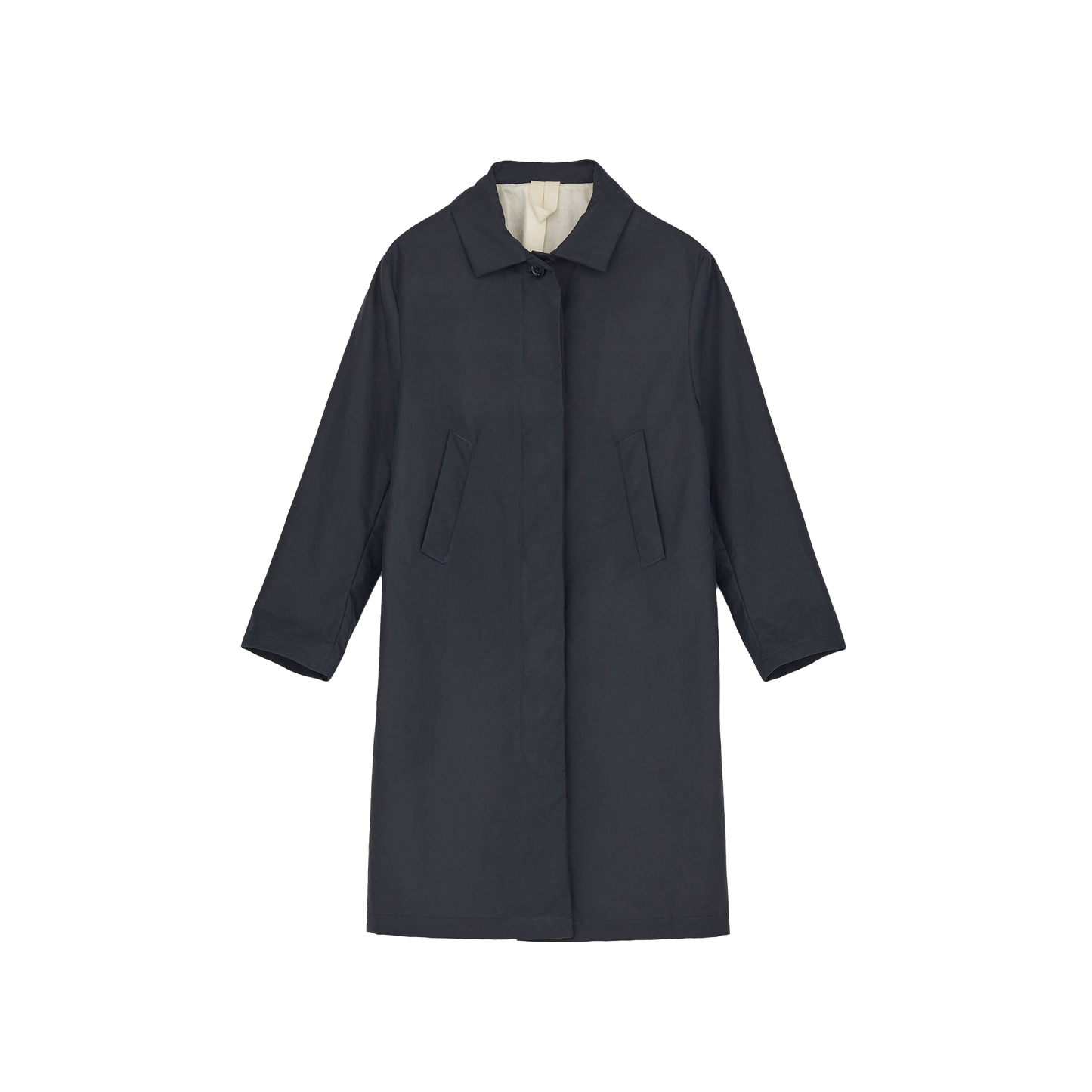 The Noor Coat Oil by Aiayu is a long, dark classic coat made from wax-coated organic cotton, featuring a classic collar and two front pockets, displayed on a plain background.