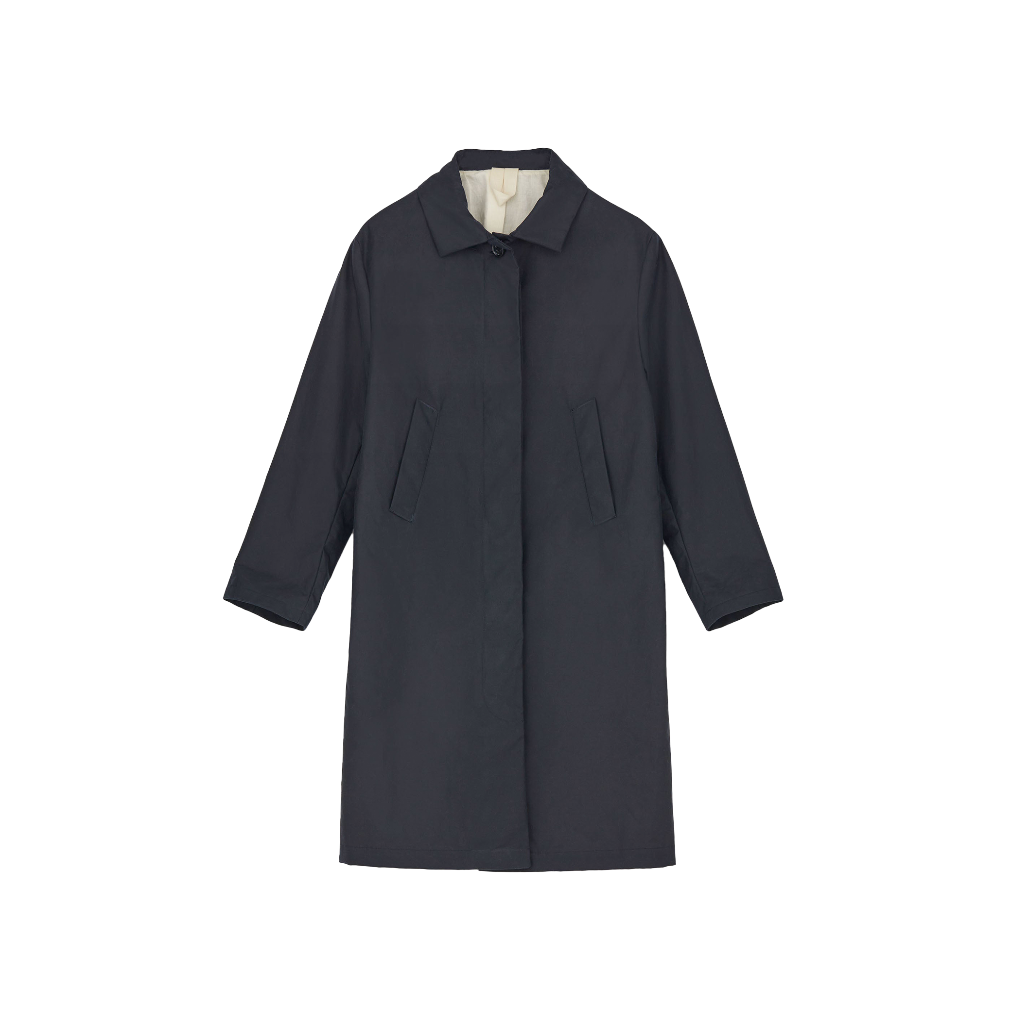 The Noor Coat Oil by Aiayu is a long, dark classic coat made from wax-coated organic cotton, featuring a classic collar and two front pockets, displayed on a plain background.