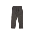 Presented on a simple backdrop, the Oxford Pant by Universal Works highlights classic tailoring with its high-quality wool fabric and button closure, providing an enduring style.