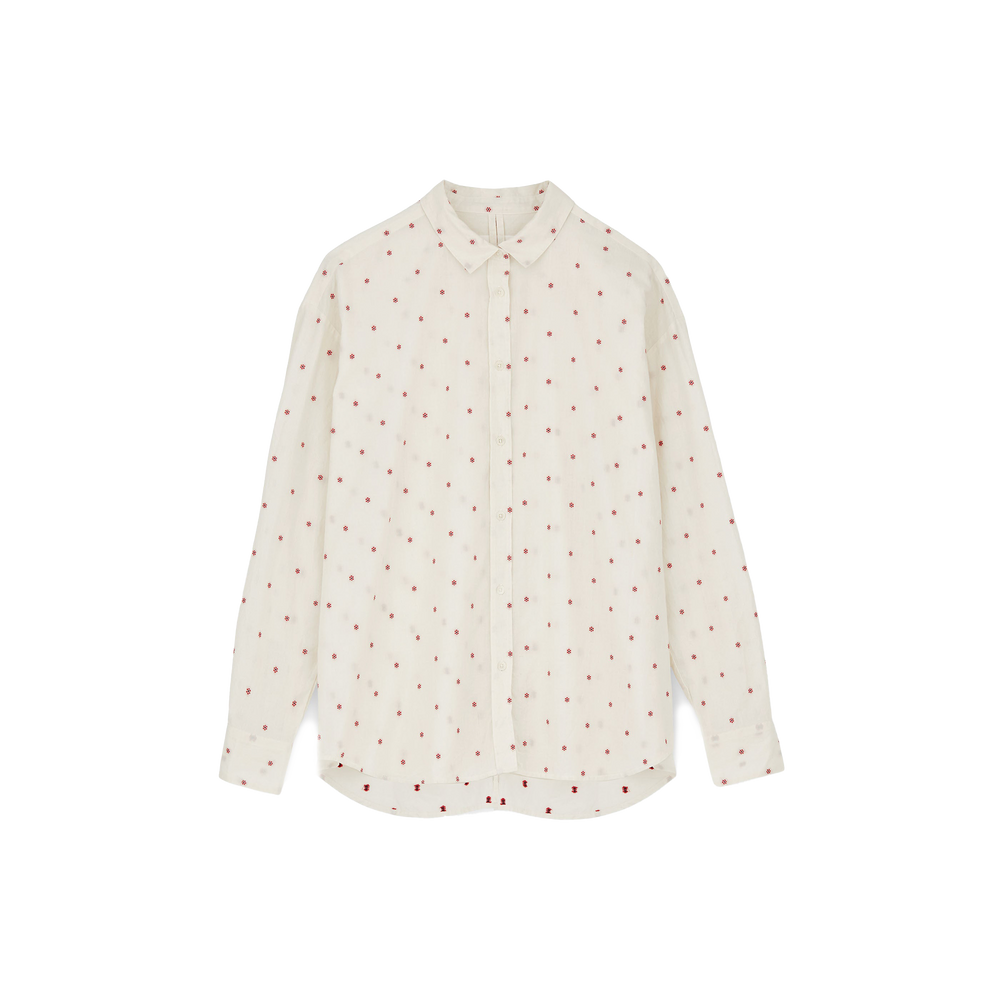 Meet the Shirt Flore by Aiayu: an elegant white long-sleeve button-up made from organic cotton with a chic red dot pattern. Finished with eco-friendly buttons and presented on a simple backdrop, it's ideal for the eco-conscious trendsetter.