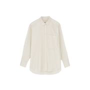 The Aiayu "Shirt Quilt" is an oversized white long-sleeve button-up with a front pocket, crafted from regenerative cotton and displayed against a plain background.