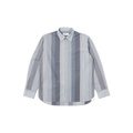 The Square Pocket Shirt by Universal Works features a relaxed fit with long sleeves and a contemporary shape, showcasing vertical stripes in shades of blue and gray. Made from 100% cotton, it is displayed against a plain background.