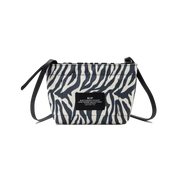 Introducing the Zipper Pouch Mini by Bags in Progress, a stylish shoulder bag featuring a zebra-print design crafted from recycled polyester. It is accented with black drawstrings and includes a label on the front.
